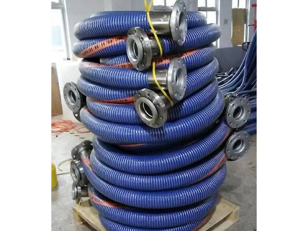 A bundle of heavy duty composite hoses on the pallet.