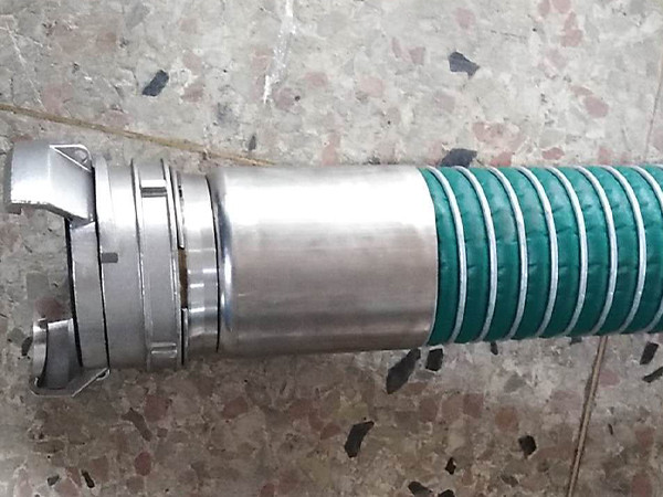PTFE composite hose fixed with tank coupling.
