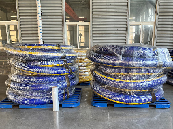 Two rolls of sealed PTFE composite hoses.